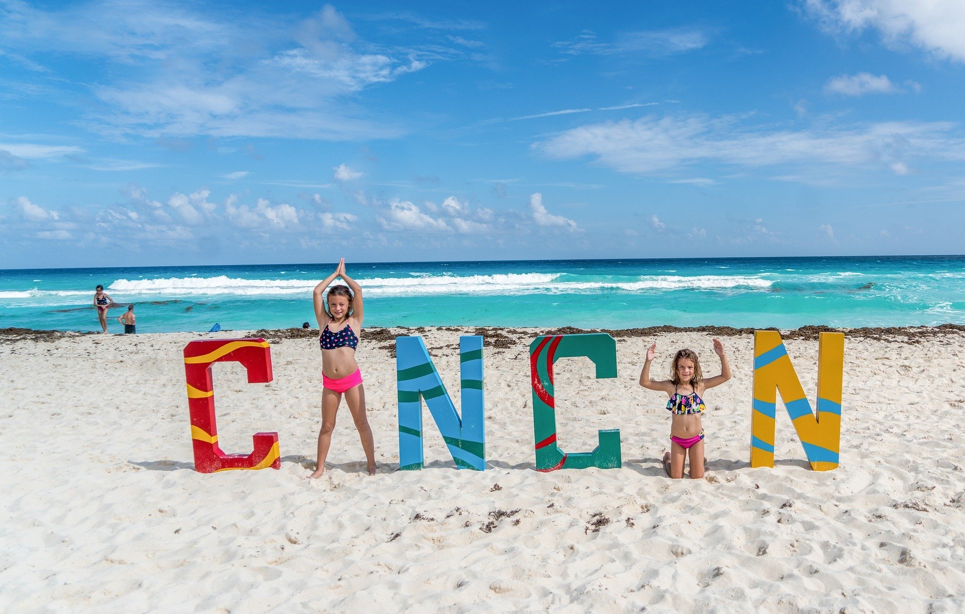 Kinderen op Cancun strand