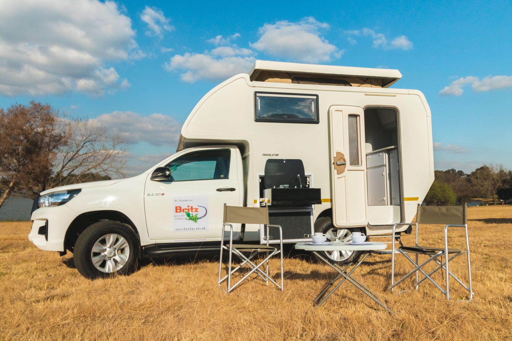 Britz NA 4x4 SC Navi 2 Berth Manual (NAVI) camper aan de zijkant